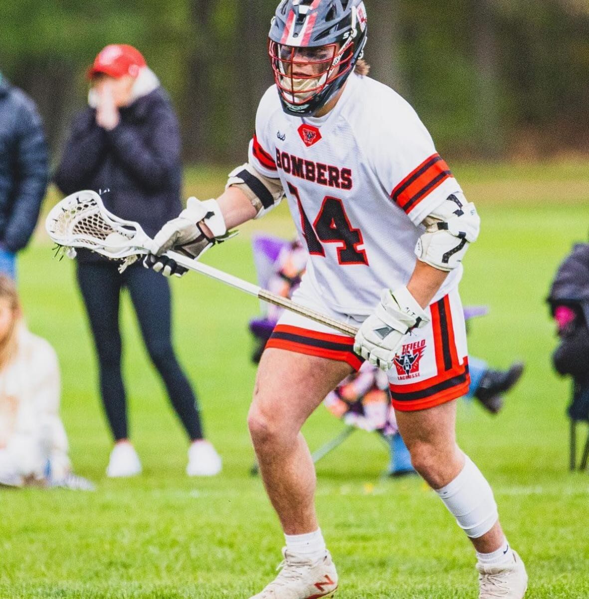 Lacrosse player in a Savage uniform